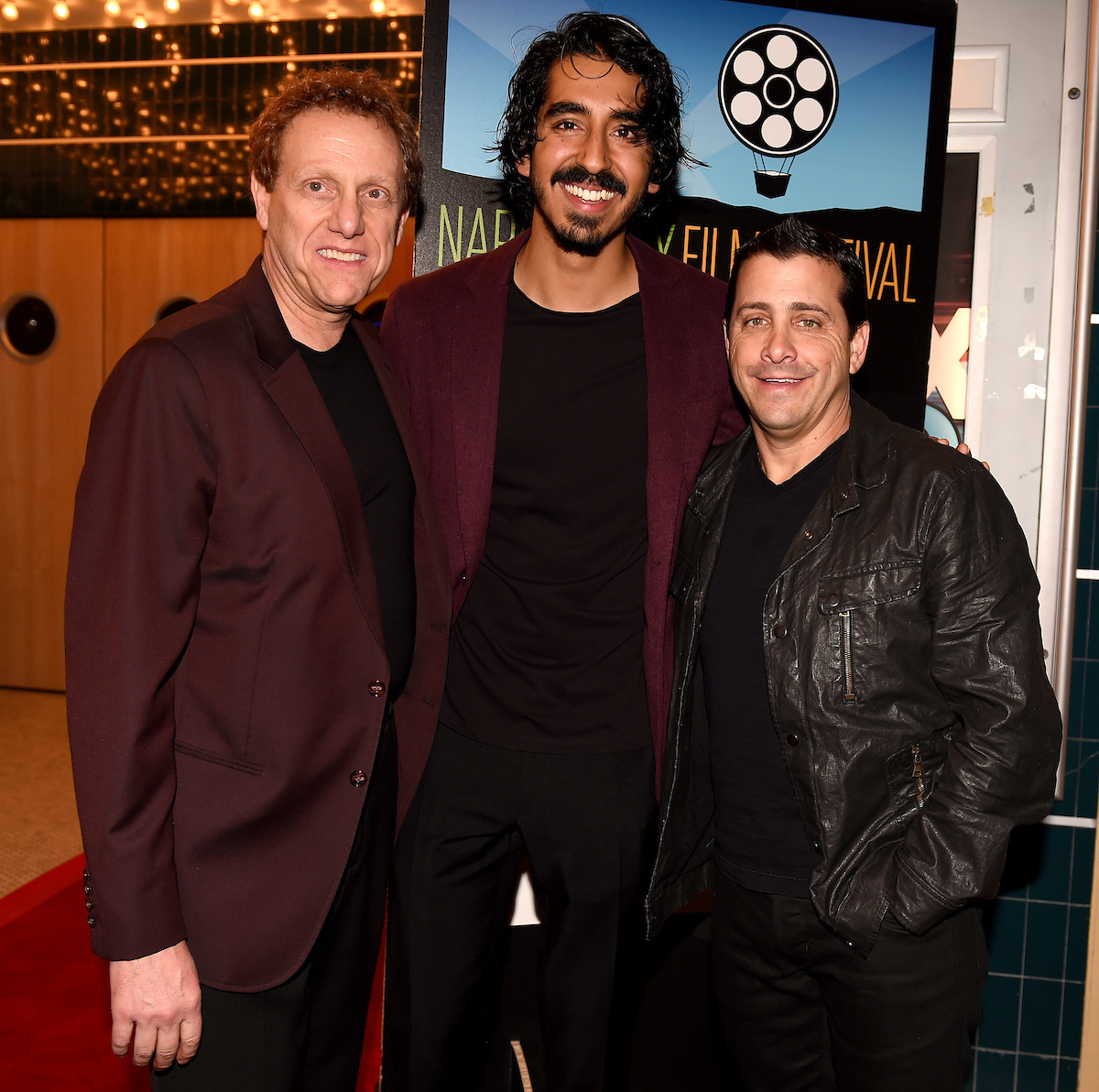 NAPA, CA - NOVEMBER 9: Napa Valley Film Festival Co-Founder Marc Lhormer, actor Dev Patel, and The Weinstein Company President and COO David Glasser attend the opening night screening and Q&A for The Weinstein Company's "Lion" at the Uptown Theatre during the 2016 Napa Valley Film Festival on November 9, 2016 in Napa, California. (Photo by Frank Micelotta/PictureGroup)